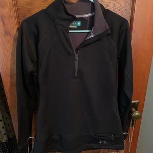 Medium Under Armor pull over sweater black in color